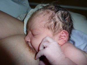 Newborn baby breastfeeding